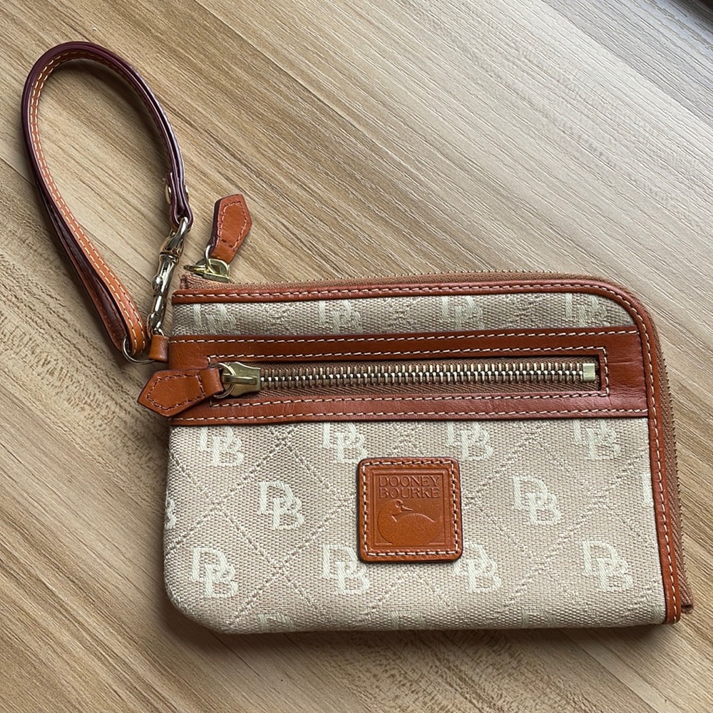 Dooney & Bourke multi function zip around wristlet